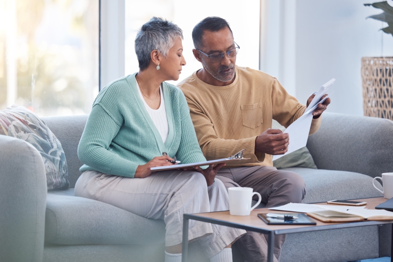Couple reviewing a document together