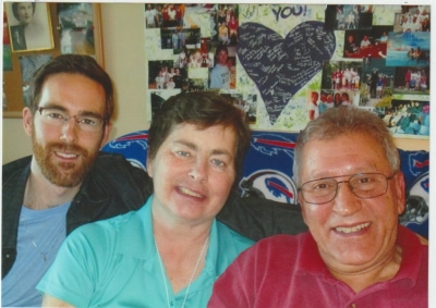 Mary-Ellen-in-her-room-at-Hospicare_-with-son-Matt-and-husband-Frankj-1024x722-0001.jpeg