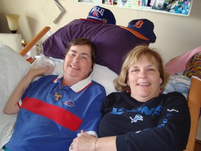 Watching-football-in-Mary-Ellens-room-with-sister-Sue.jpg