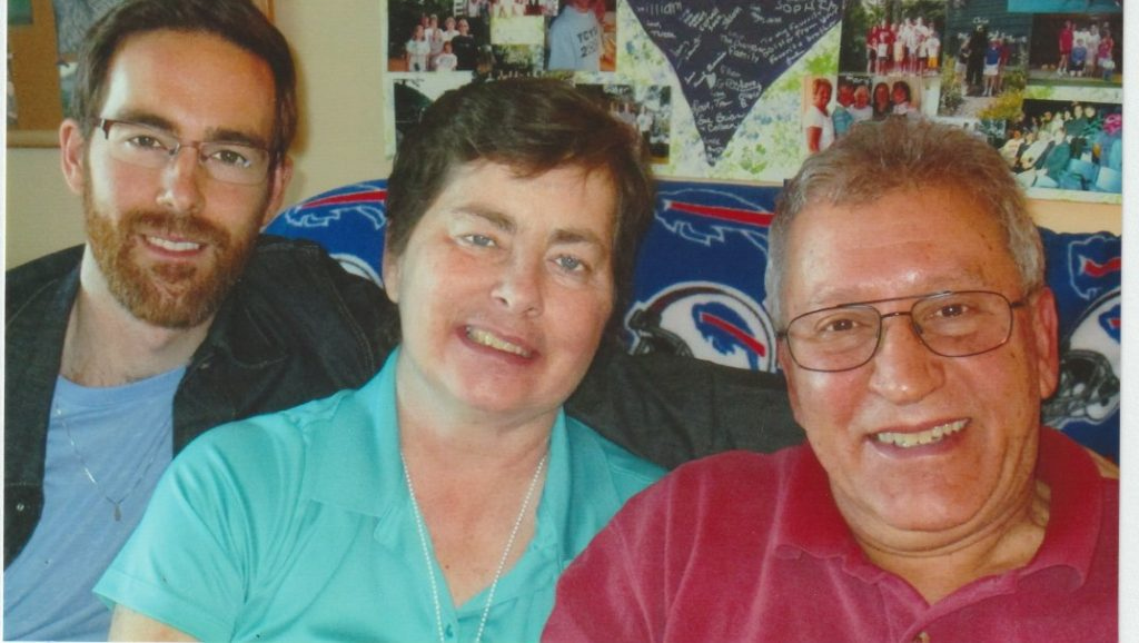 Mary-Ellen-in-her-room-at-Hospicare_-with-son-Matt-and-husband-Frankj-1024x722.jpeg